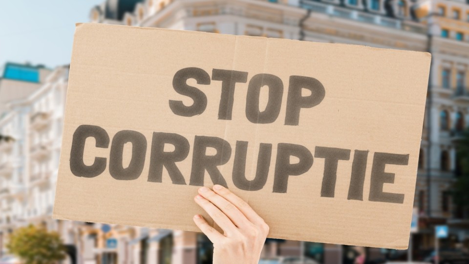 Protestbord stop corruptie