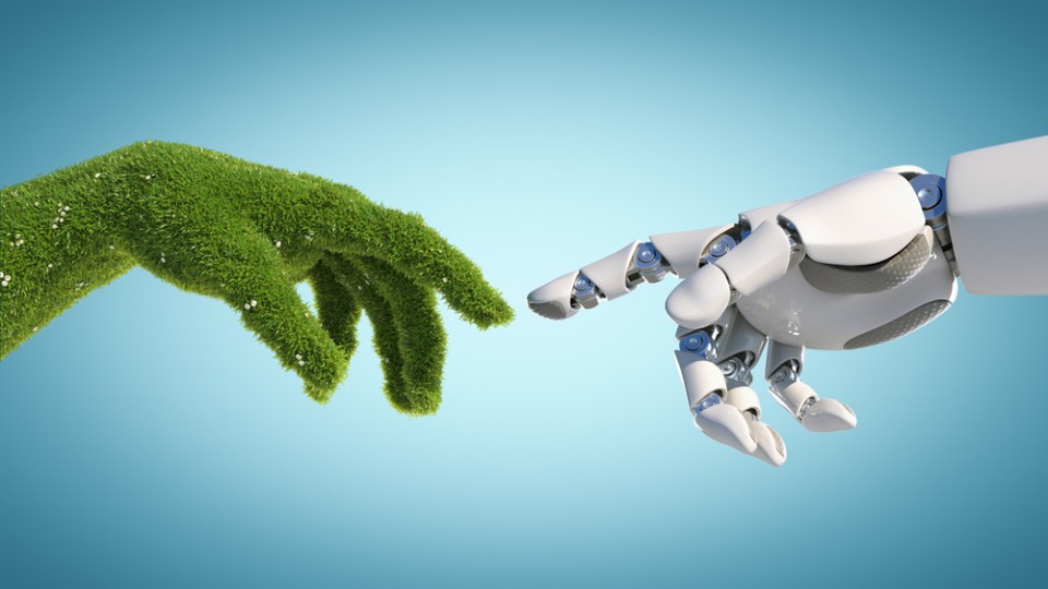 Robothand en grashand