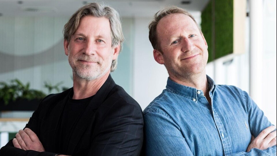 Portretten van Martijn Aslander en Kees Verhoeven, beide met armen over elkaar