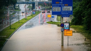 Dijknormen, extreme regenval en waterrisico's