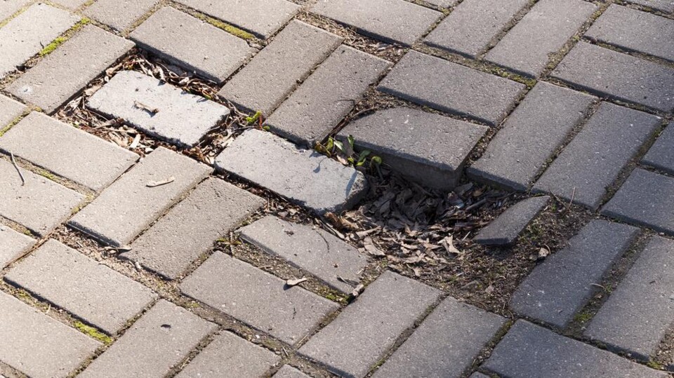 Trottoir - verzakt gat