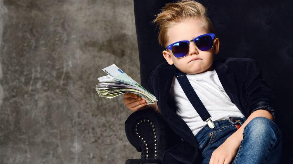 Kind met veel geld