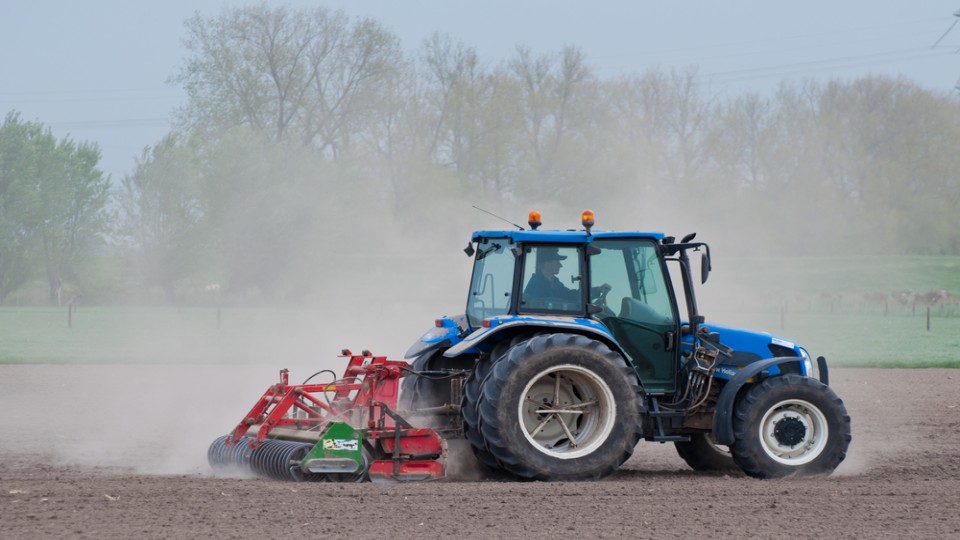 Boer in tractor
